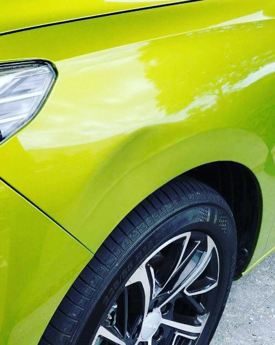 After: finished panel, close view on a lime green Haval