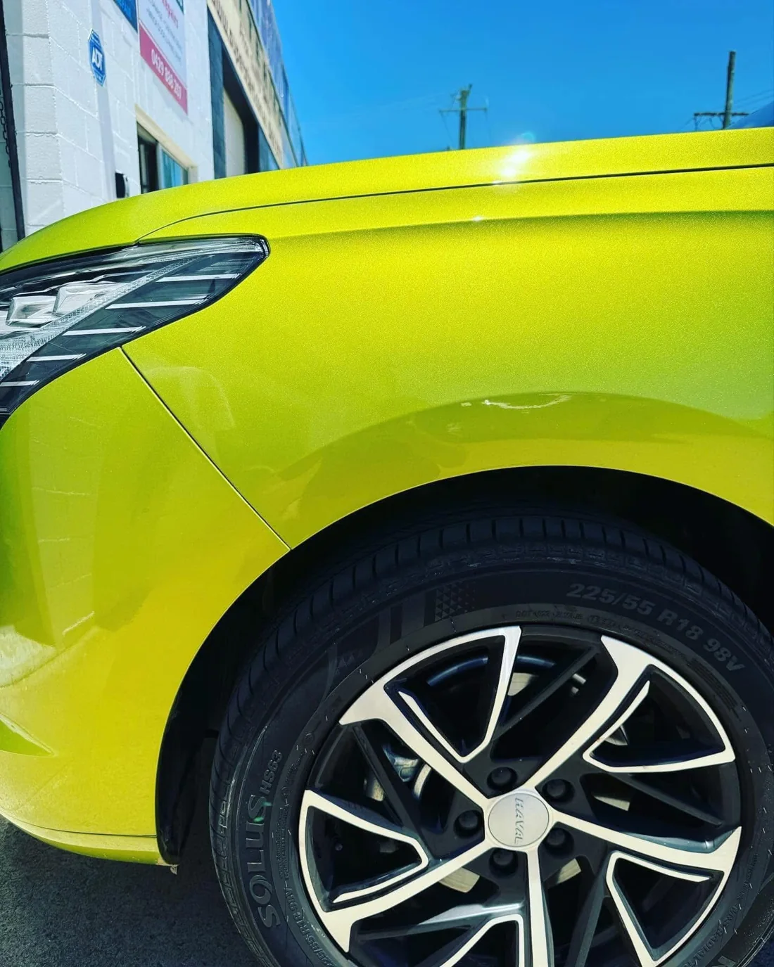 After: finished panel, front view on a lime green Haval